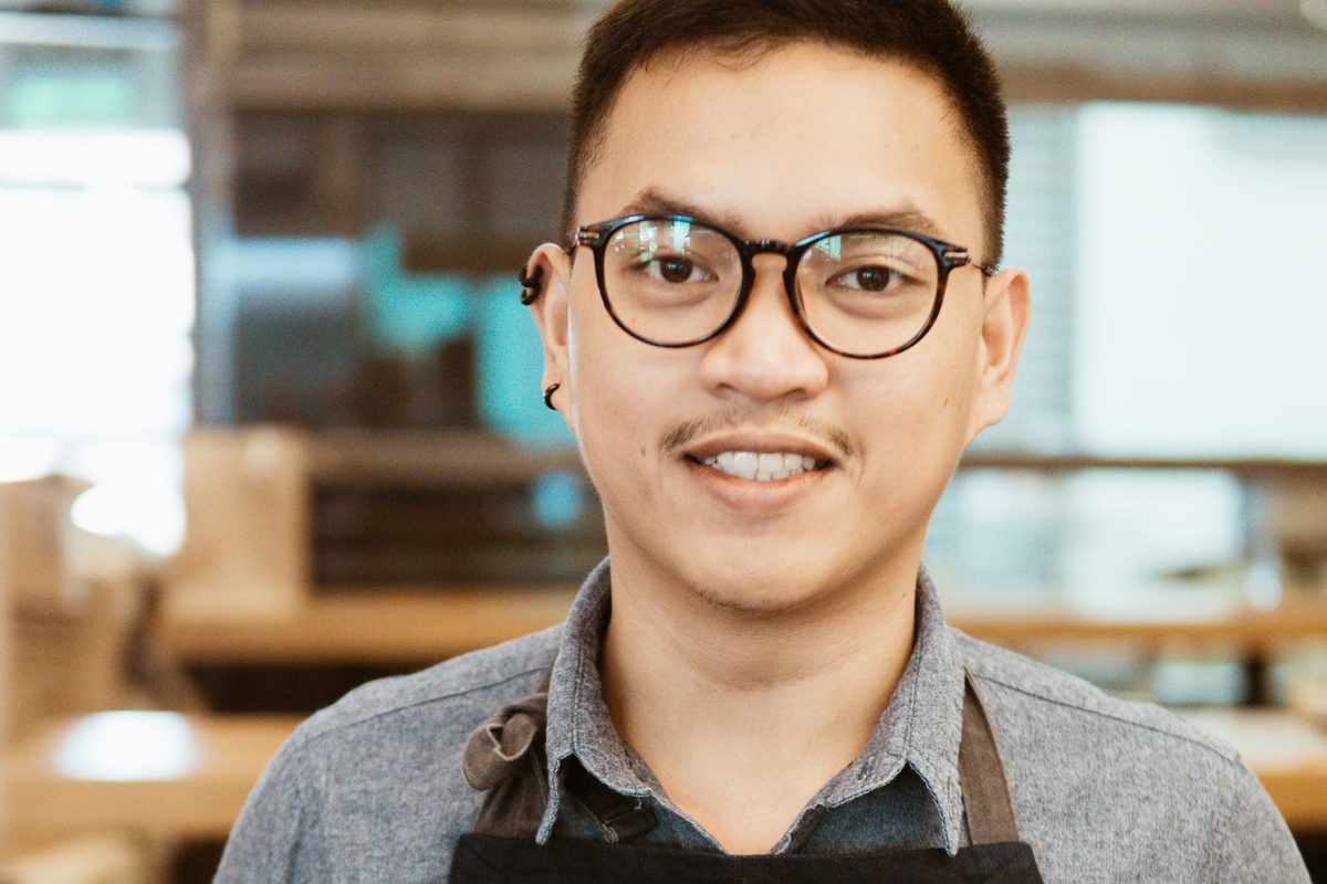 A barista in a café in Manila